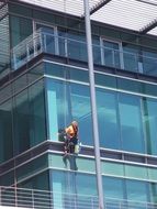 window cleaners on a building