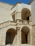 historic house with external staircase, italy, puglia