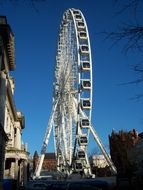 White feris wheel in amusement park