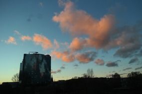 evening sky and glass skyscraper