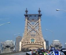 bicyclists on bridge, usa, new york city