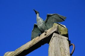 wooden sculpture in the form of a bird