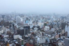 view of the cityscape on a cloudy day