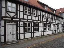 truss house black and white facade
