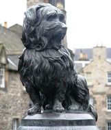 bronze statue of a dog in scotland