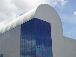 unusual building with a glass facade
