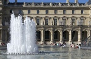 fountain near the louvre on a sunny day