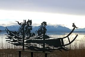 ship as a sculpture on the shore of Lake Chiemsee