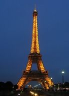 night view of the Eiffel Tower against the sky