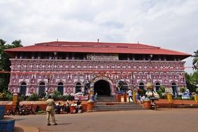 Market in a square in front of a Hindu temple