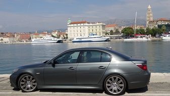 grey auto in view of old town port, croatia, dalmatia