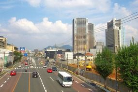 city road near skyscrapers