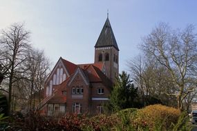 church with a spire among the picturesque nature in Germany