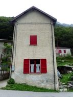 stone house with narrow window