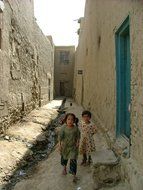 children mud houses