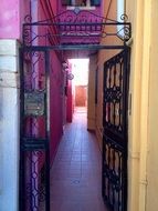 wrought iron gate in the backyard, Italy