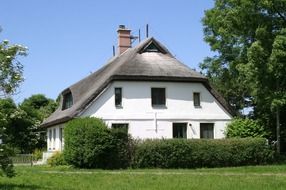 Nice white house with thatched roof