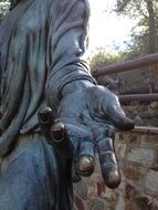 hand on sculpture of saint joseph close up