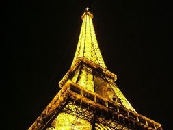 Eiffel tower at night in Paris France
