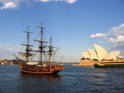 ship on the water near the sydney opera house