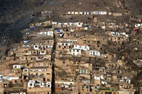 view from the mountain to houses in afghanistan