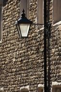 old lantern on a stone wall