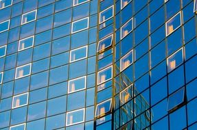 blue glass facade of a modern office