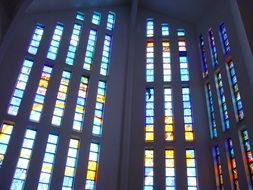 multicolored stained glass windows in the catholic church