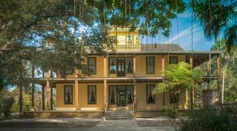 yellow building with terrace, usa, california, koreshan state park