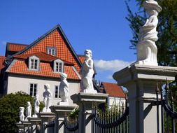 castle and stone statues