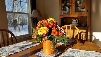 Flower bouquet on the wooden table