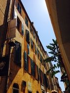 facades of houses in corsica under the bright sun