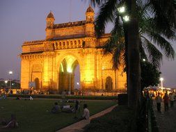 building with arched passage at night, india