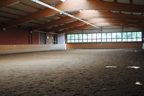 riding hangar with the lights inside