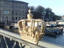 crown at bridge fence, sweden, stockholm