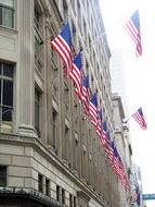 flags array at wall, usa, new york city