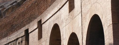 wall of Colosseum close up, italy, rome