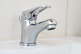 chrome faucet in bathroom