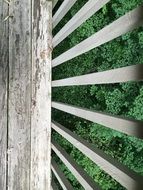 Metal railing on a wooden porch