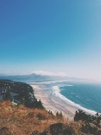 ocean shore and mountains