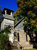 ancient wooden church among the trees