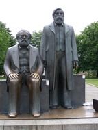 two bearded man like a statue in berlin