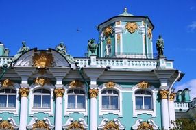 historic turquoise and white building facade