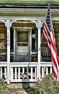 stone house flag home quaint