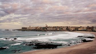 seascape on the background of the cityscape of Galicia, Spain