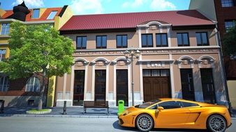 yellow car parked on a city street on a sunny day