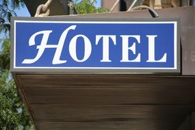 white blue hotel sign