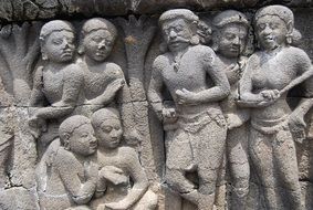 stone sculptures on the temple wall