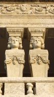 statues on a city building in cuba