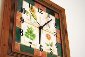 brown wall clock close-up